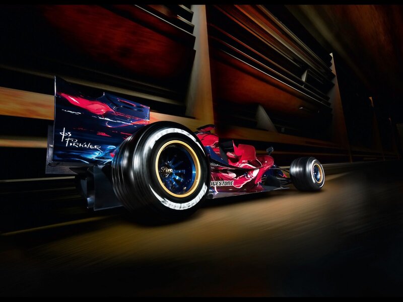 Red and blue race car in motion