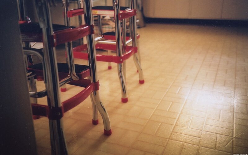 red and chrome stools in kitchen