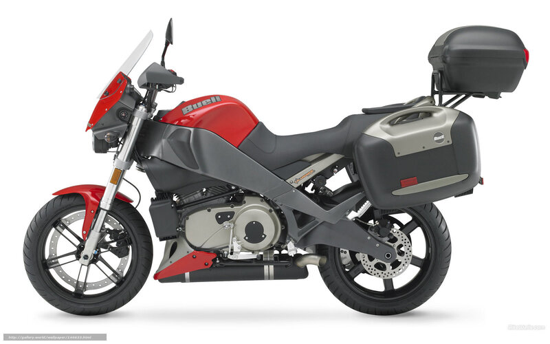 red and gray motorcycle with luggage