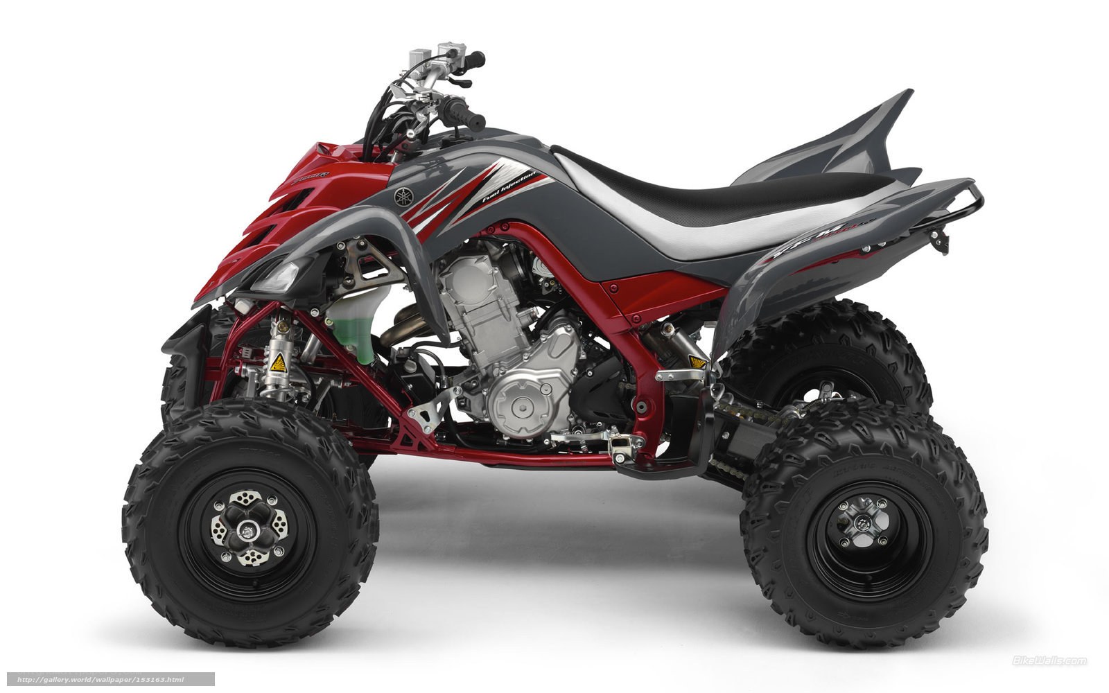red and gray quad bike