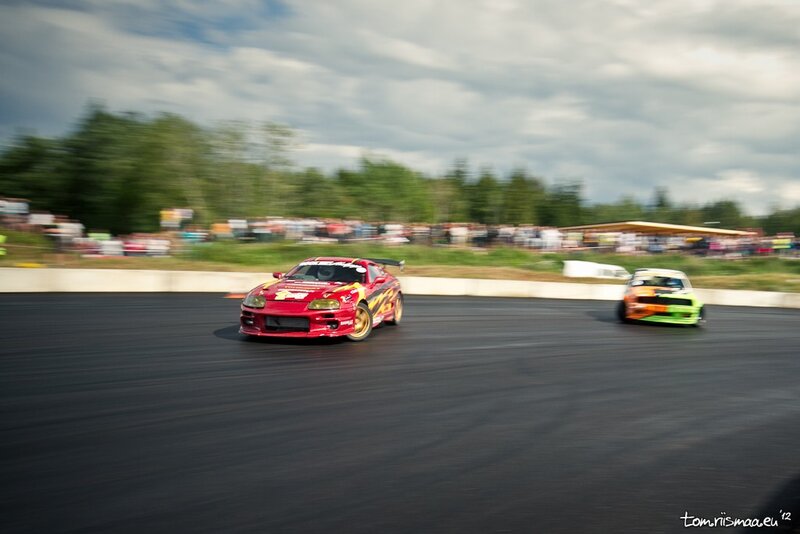 Red and Green Cars Drifting