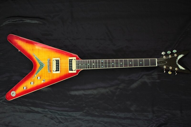 red and orange electric guitar