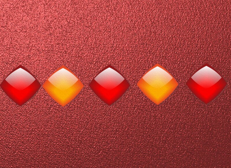Red and orange gemstones on red background