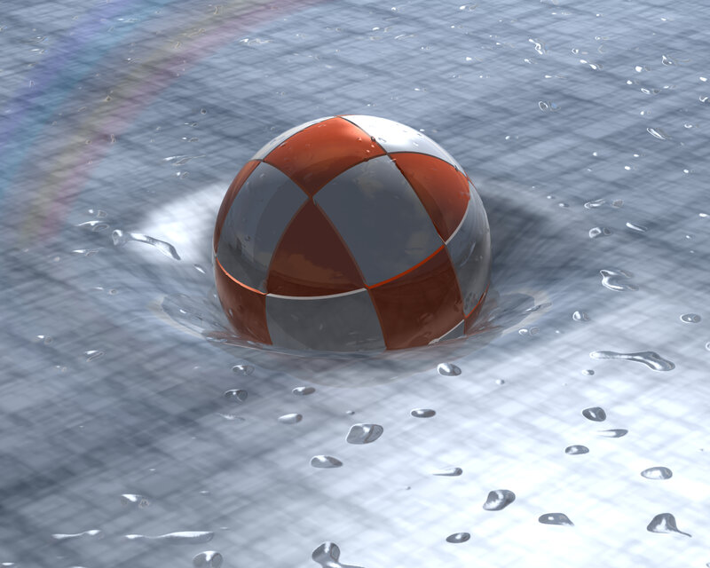 red and silver ball in water