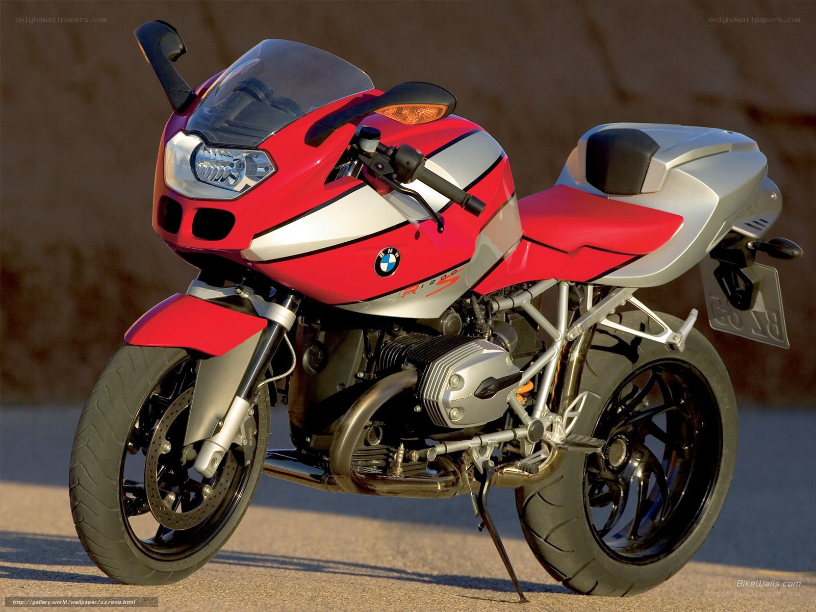red and silver bmw motorcycle