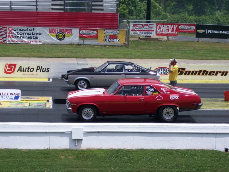 Red and Silver Cars on Track