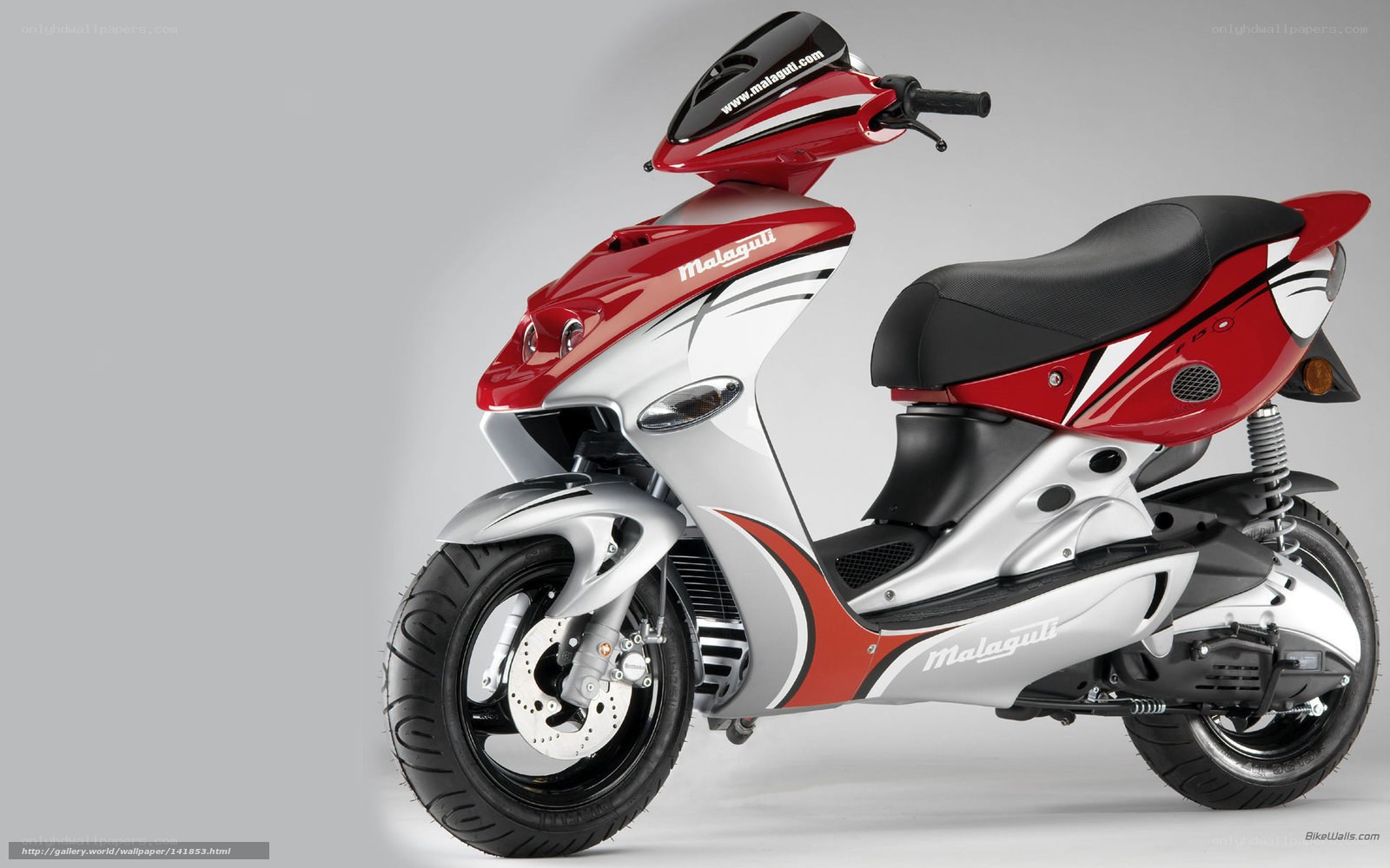 Red and silver Malaguti scooter