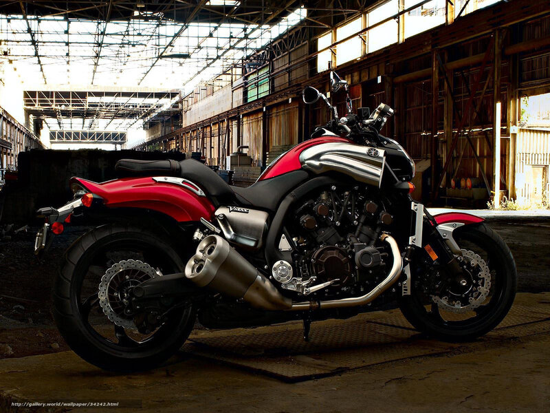Red and silver motorcycle in warehouse