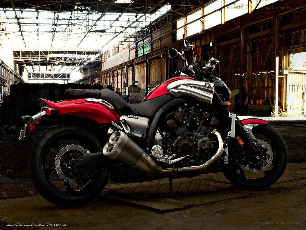 Red and silver motorcycle in warehouse