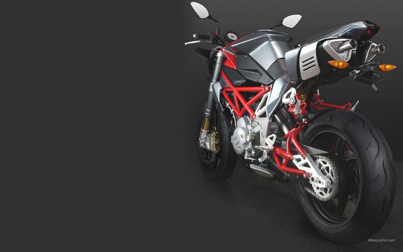 red and silver sport motorcycle