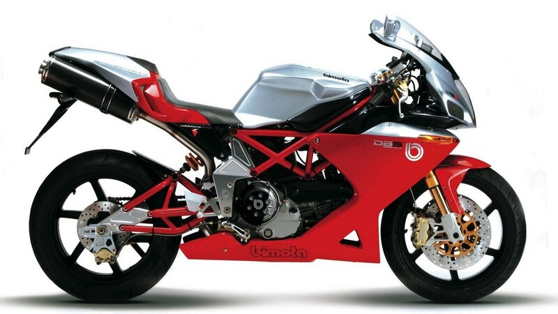 red and silver sport motorcycle