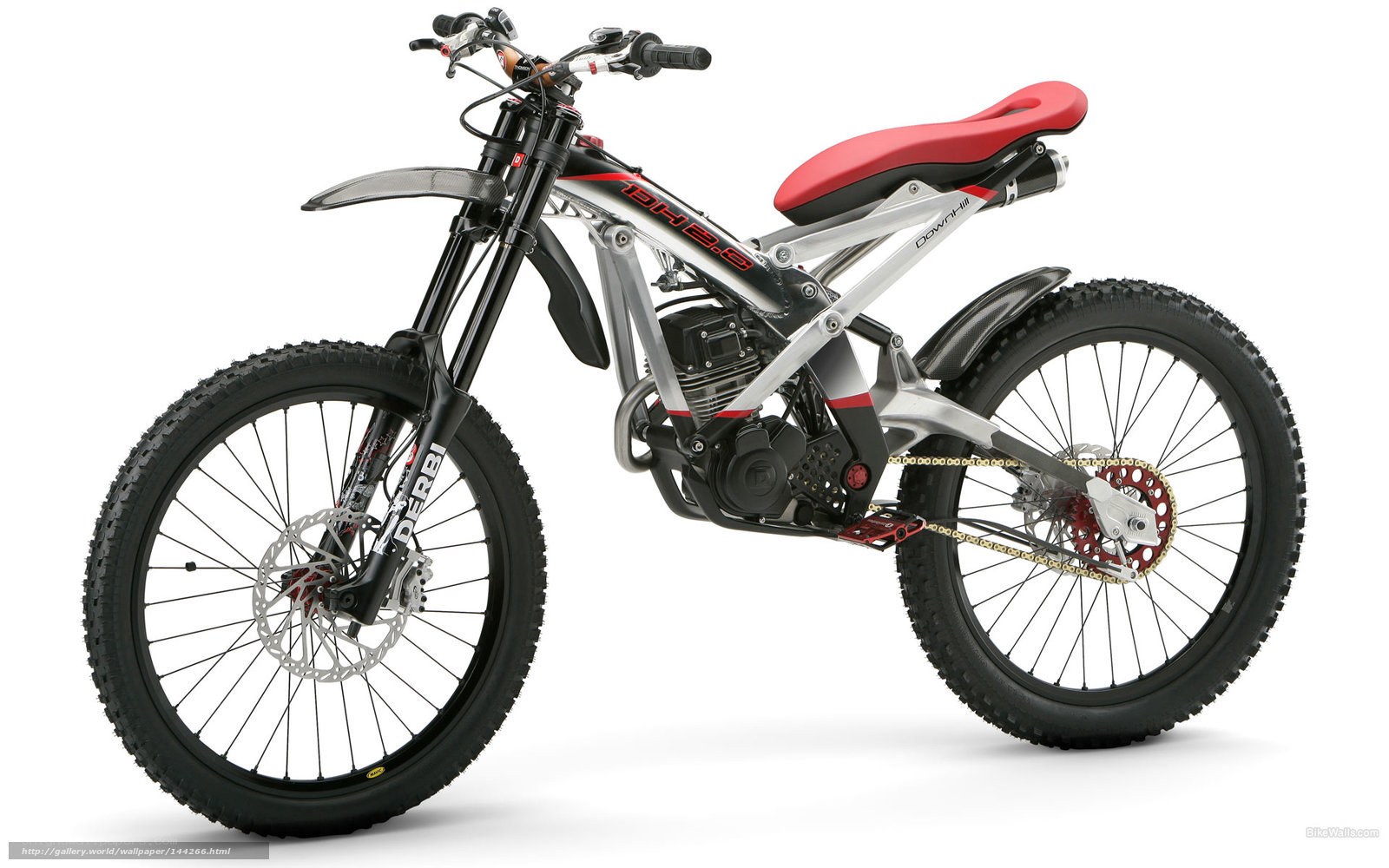 red and silver trial motorcycle