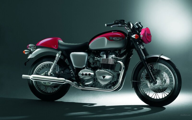Red and silver Triumph motorcycle