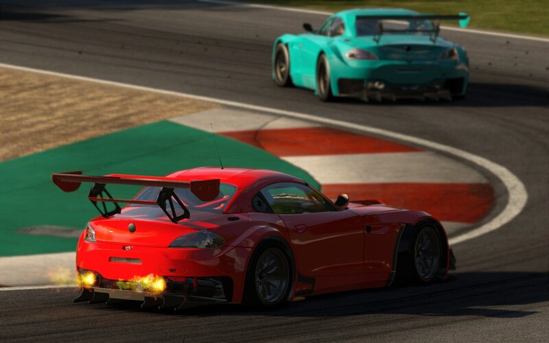 Red and teal race cars on track