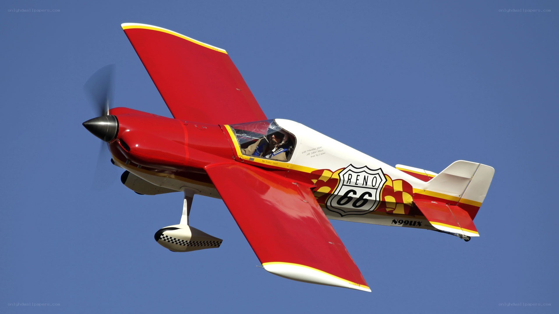Red and white aerobatic plane