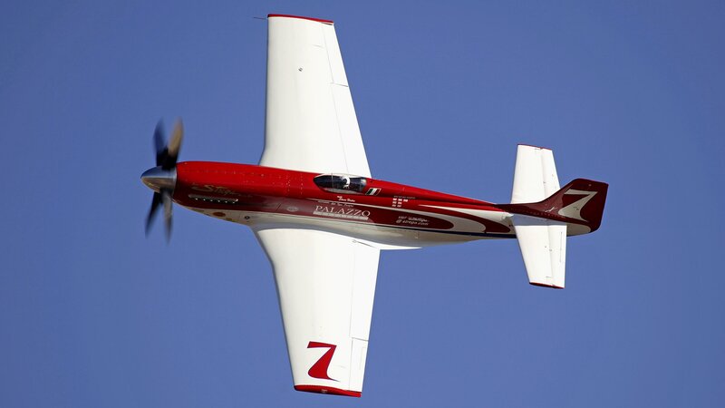 Red and White Aerobatic Plane — Blue