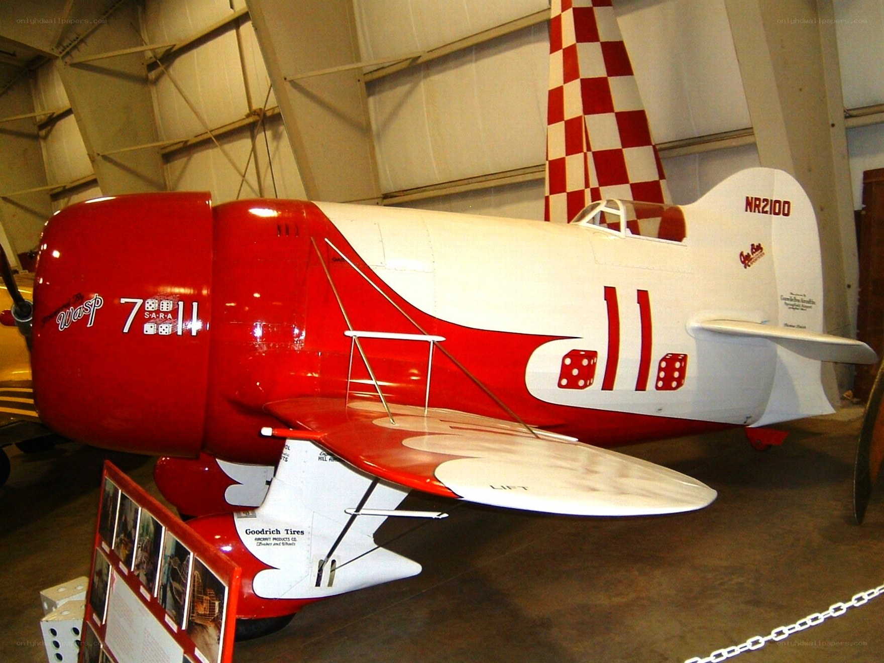 Red and white aerobatic plane