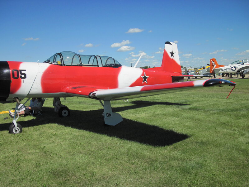 Red and White Airplane — Outdoor, Afternoon, Photograph, Grass Field