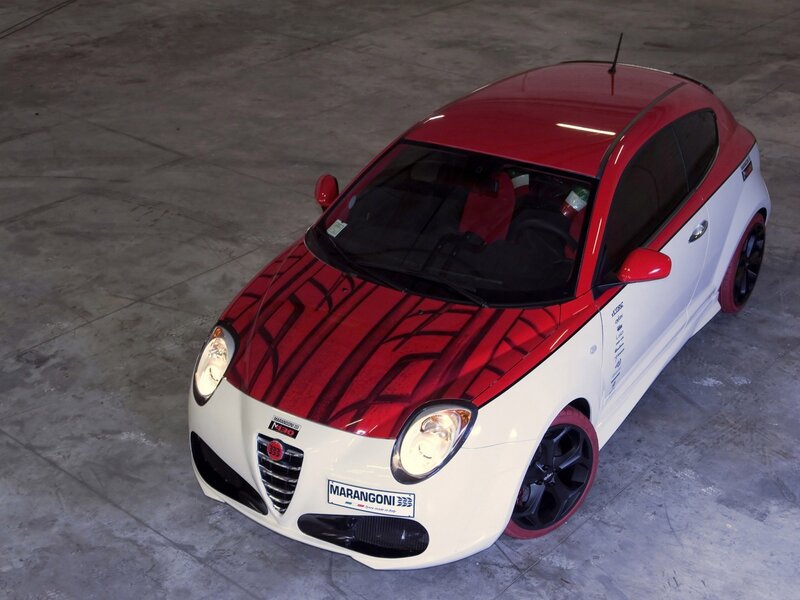 Red and white Alfa Romeo car