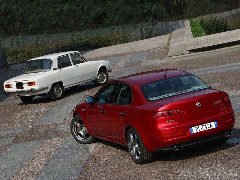 Red and white Alfa Romeo cars