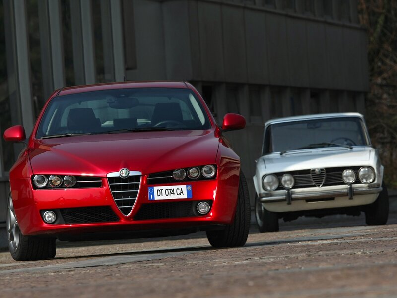 Red and white Alfa Romeo cars