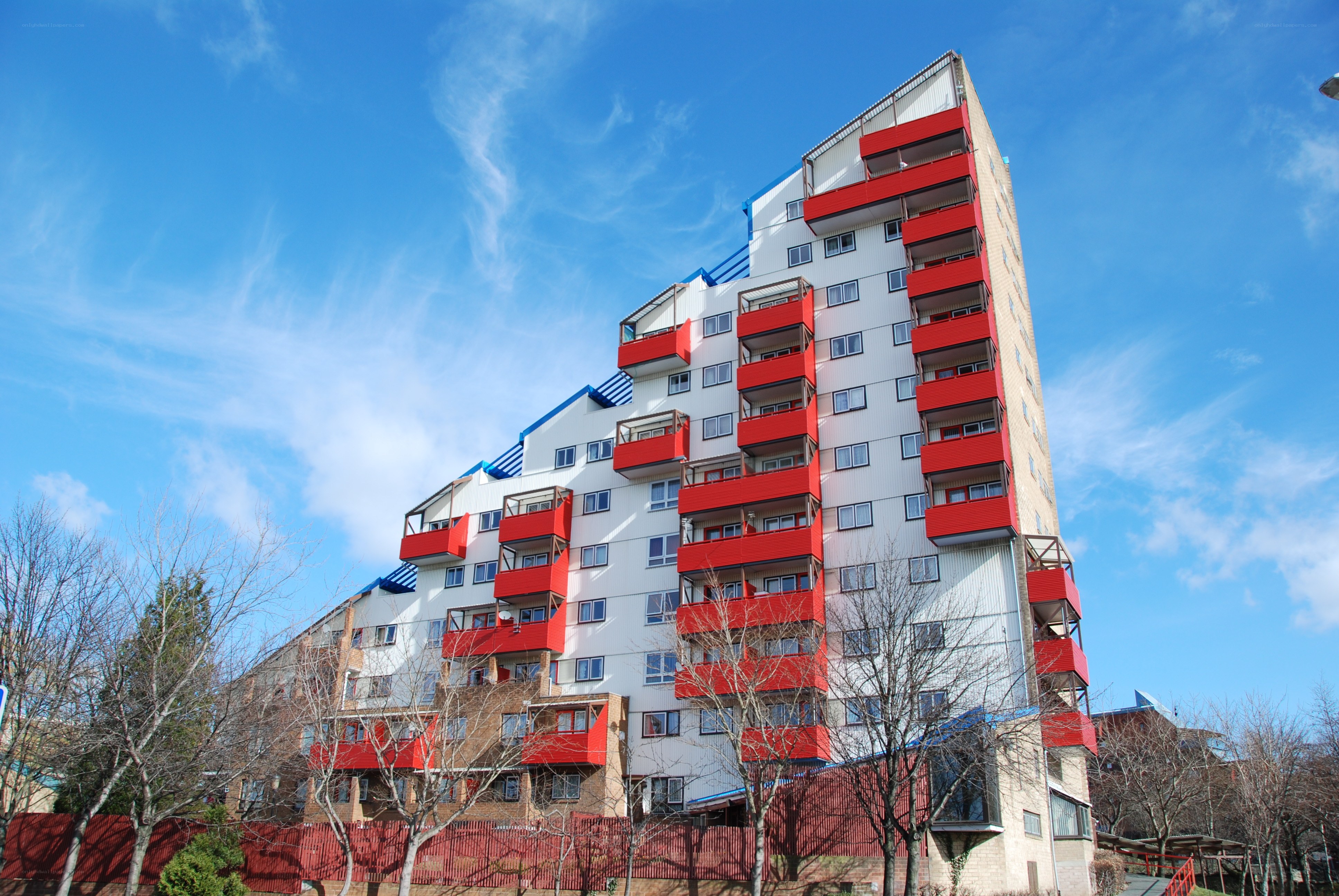 Red and white apartment building