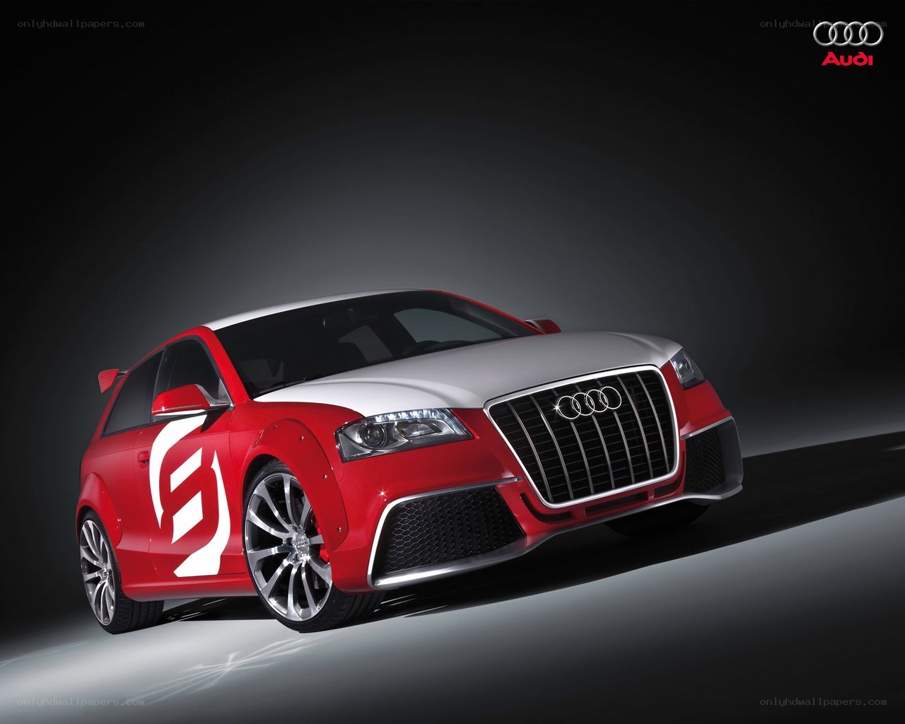 Red and white Audi performance car