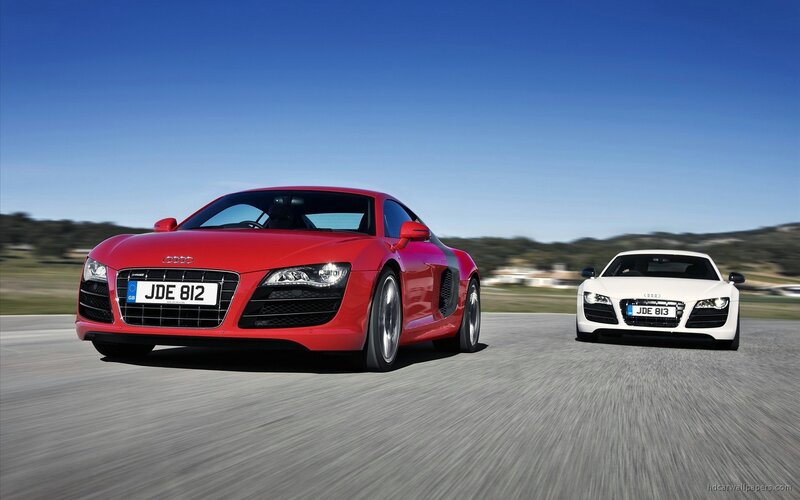 Red and white Audi R8 sports cars