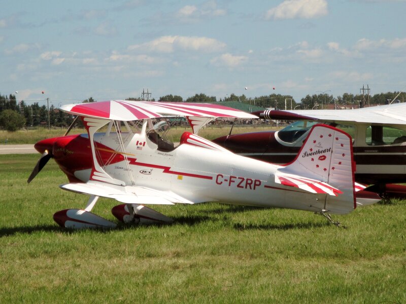Red and White Biplane — Calm, Afternoon