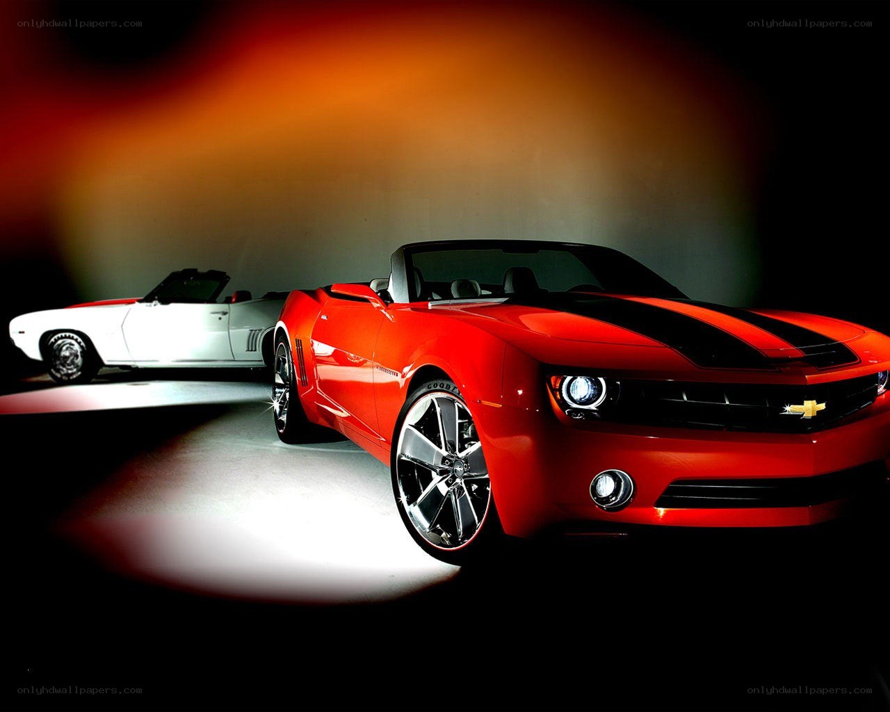 Red and white Camaro convertibles