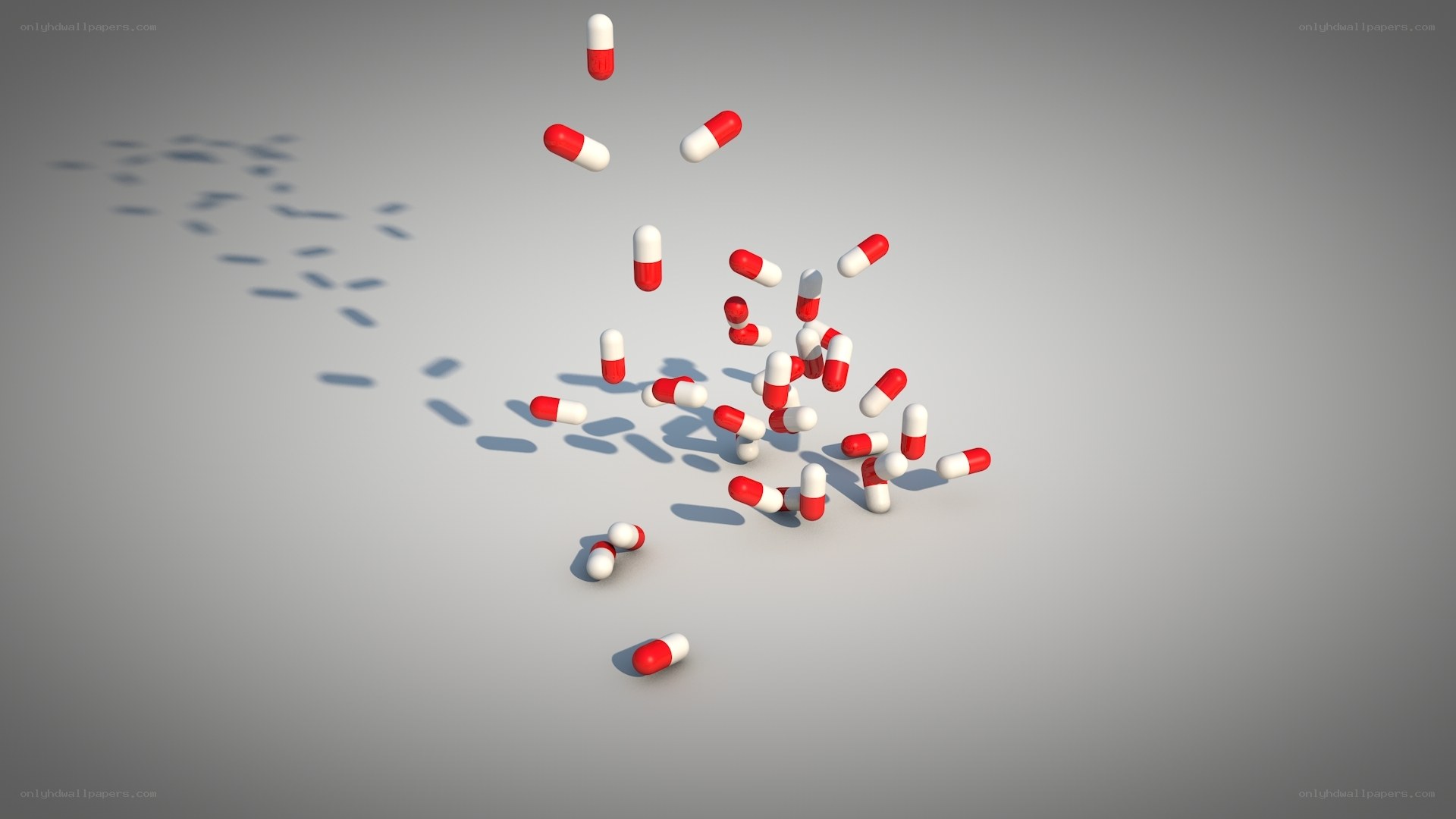 Red and white capsules falling