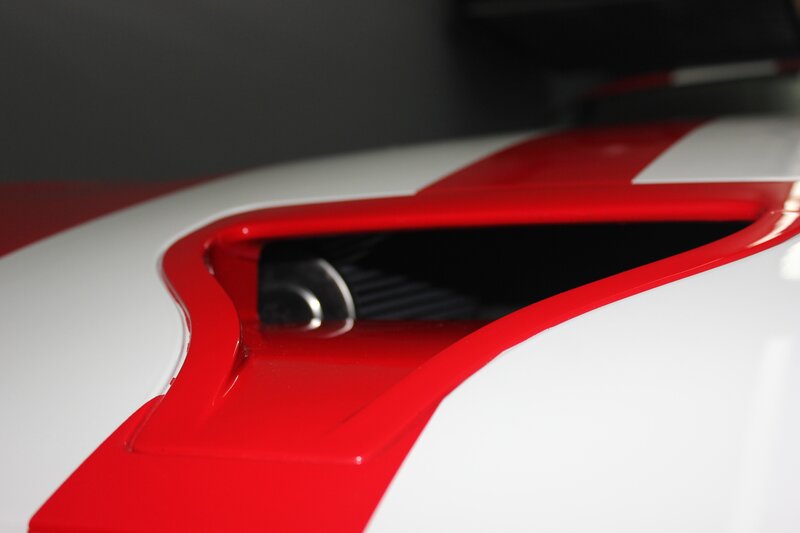 Red and White Car Panel