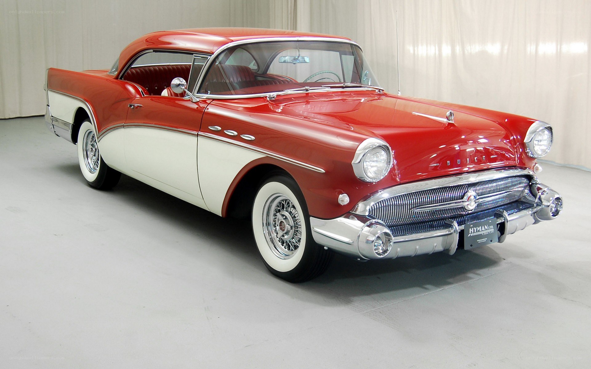 Red and white classic Buick