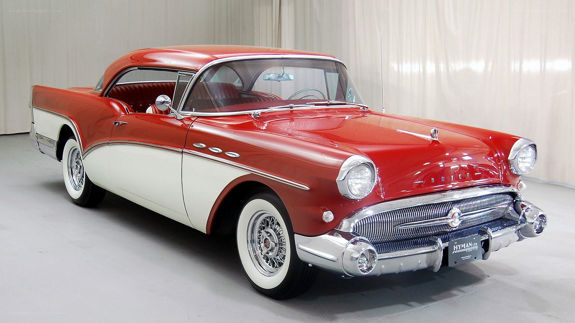 Red and white classic Buick