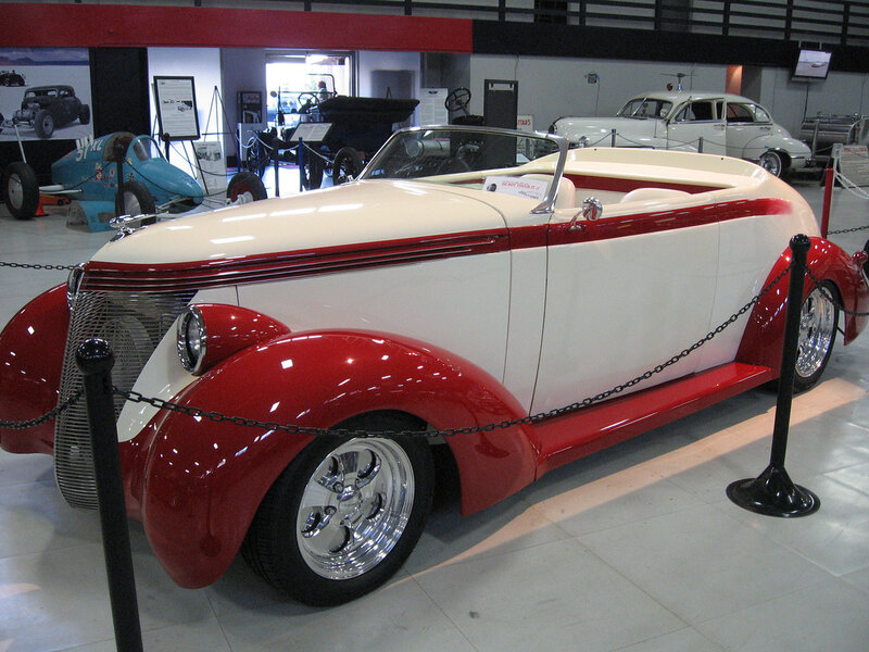 Red and white classic convertible car