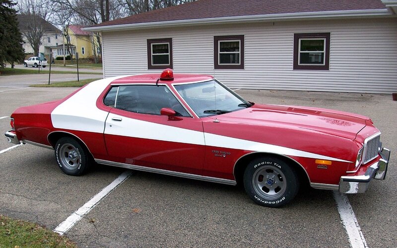 Red and white classic police car