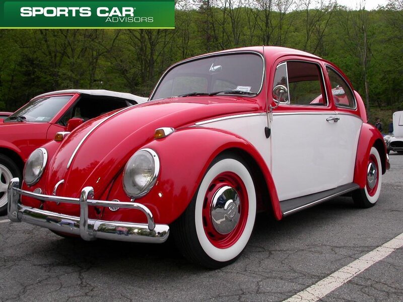 Red and white classic Volkswagen Beetle