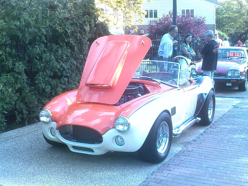 Red and White Convertible Car