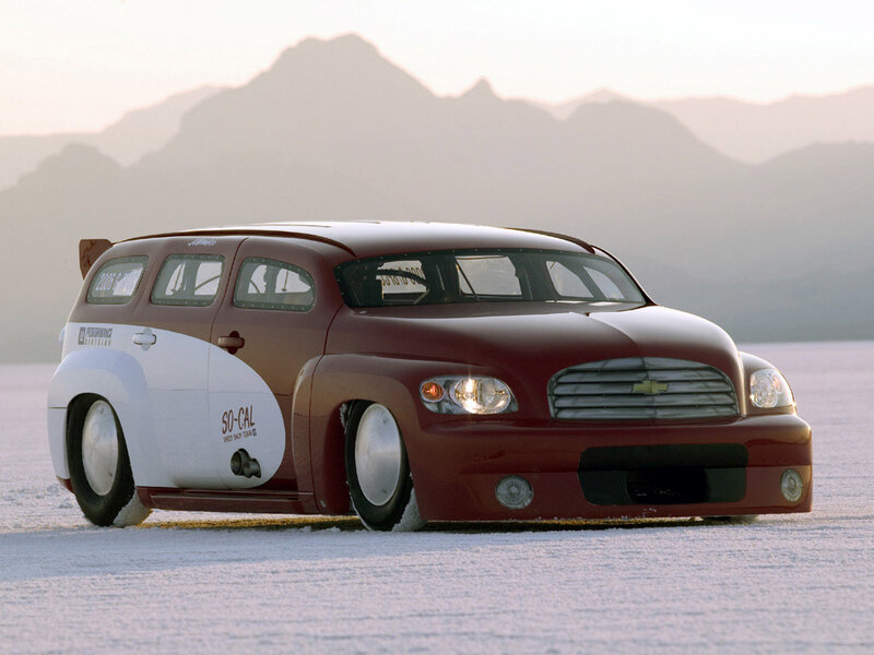 red and white custom car on salt flat