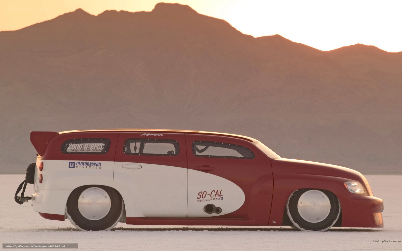 red and white custom car on salt flat