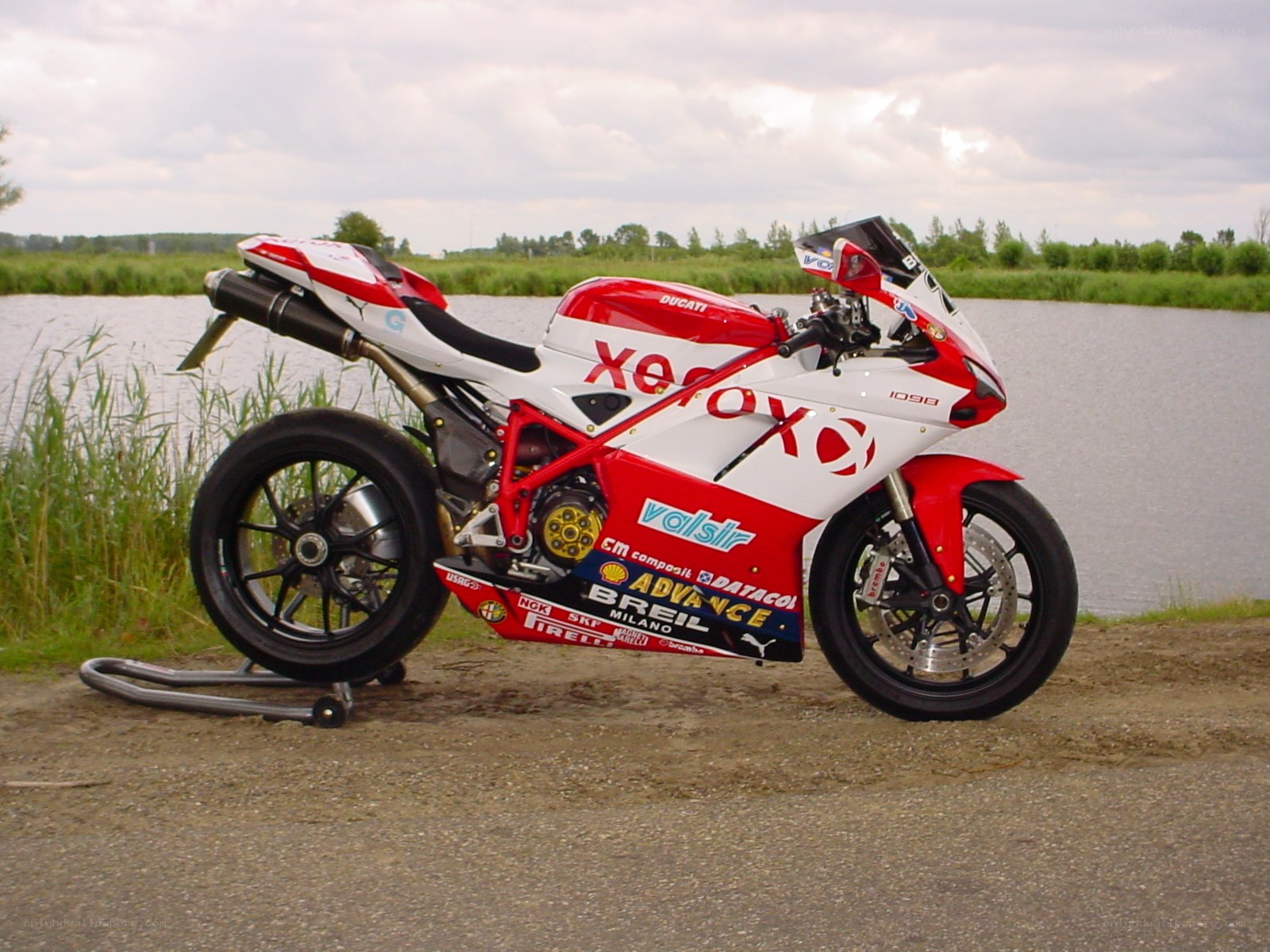 Red and white Ducati motorcycle