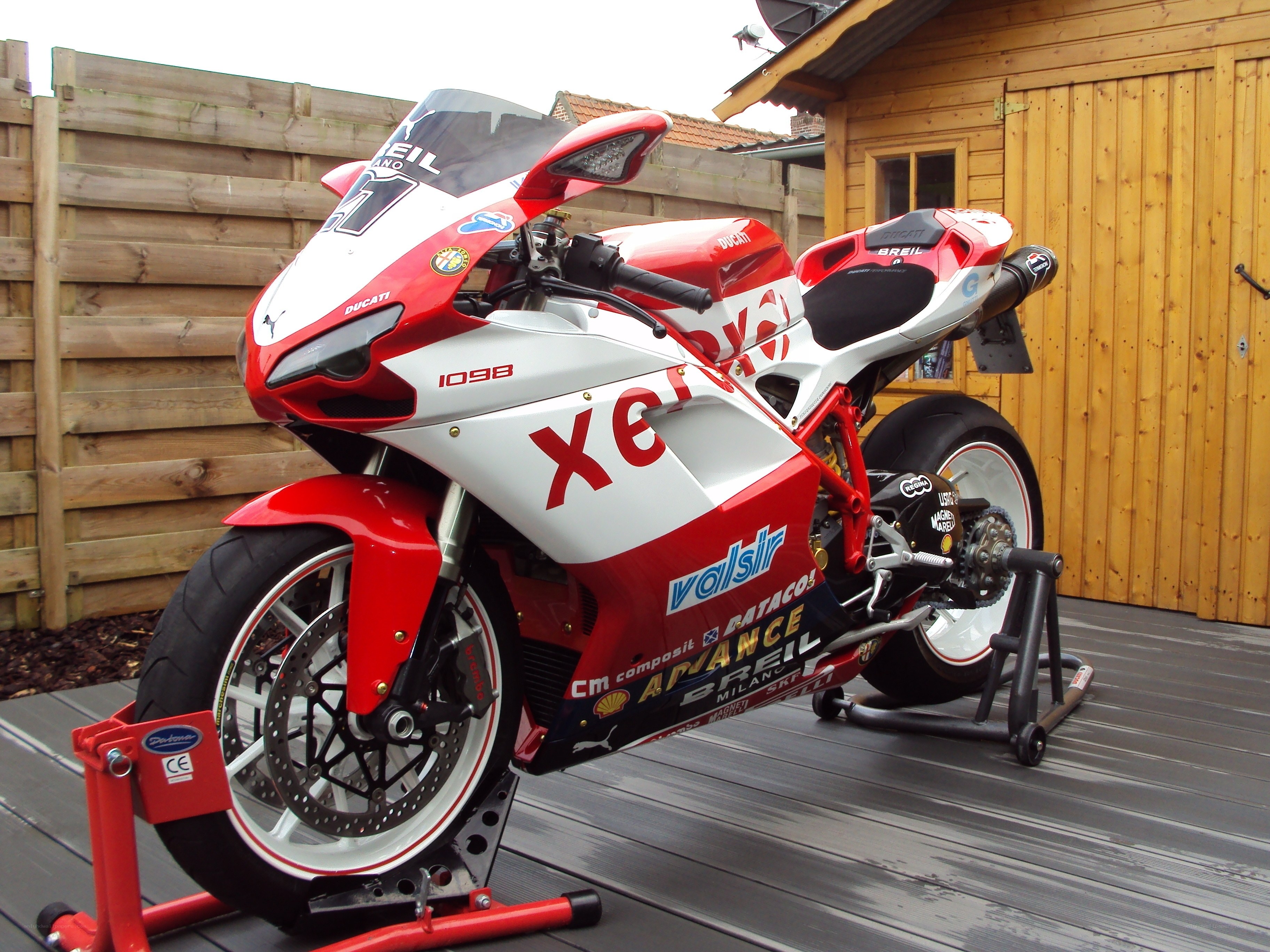 Red and white Ducati motorcycle