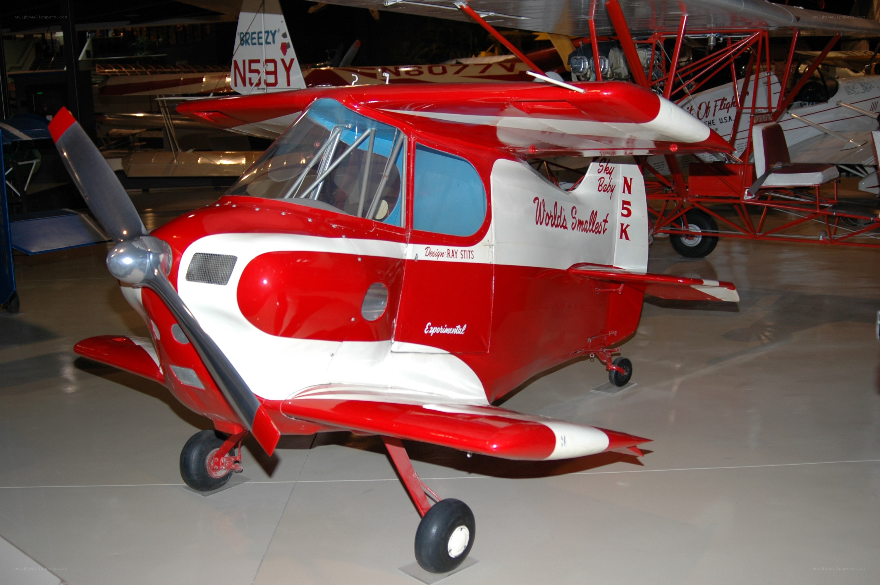 Red and white experimental airplane