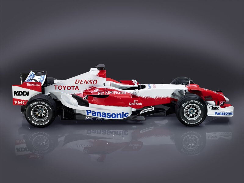 Red and White Formula One Car — Dramatic, Photograph, Sponsors
