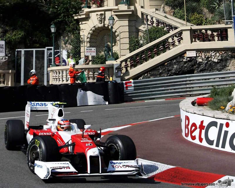Red and White Formula One Car — Dynamic