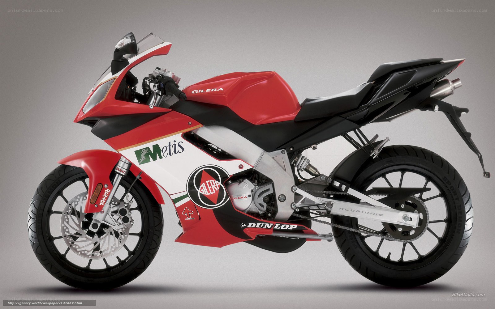 red and white Gilera motorcycle