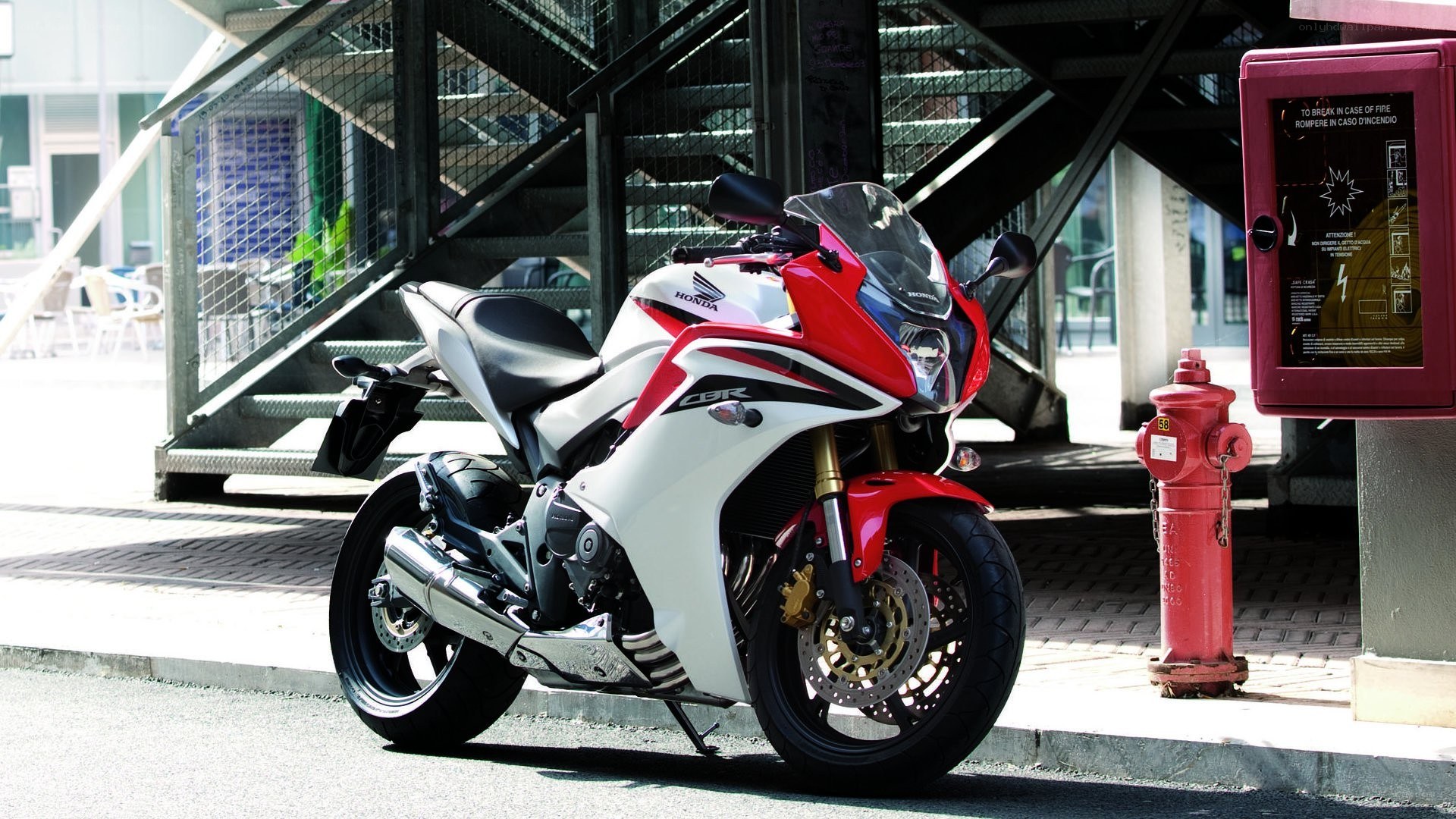 Red and white Honda CBR motorcycle