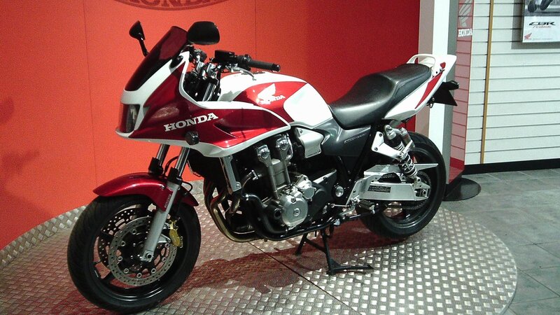 Red and White Honda Motorcycle