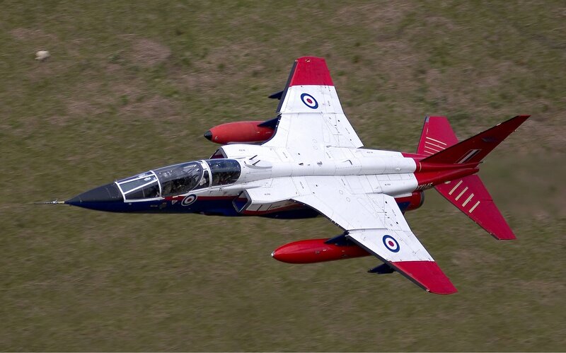 Red and White Jet Aircraft — Dynamic, Afternoon, Photograph