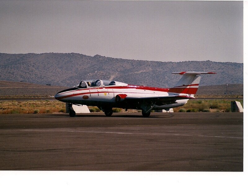 Red and White Jet Aircraft — Neutral, Afternoon